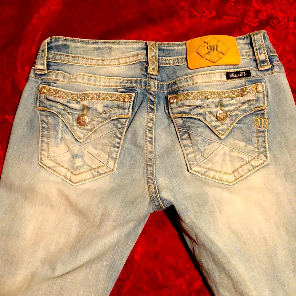 Vintage pair Miss Me Sz 30 jeans with bling and destruction!! Light wash